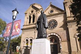 USA, New Mexico, Santa Fe, Statue of Archbishop Lamy outside the front of the Cathedral Of St