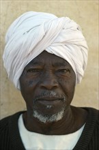 SUDAN, People, Men, Head and shoulders portrait of Chadian refugee man.