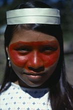 ECUADOR, People, Girls, Portrait of Auca Indian girl from Christian group with her face decorated