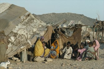 SUDAN, South Tokar, Gadem District, Beja nomad Beni Amer tribeswomen and children from Eritrea