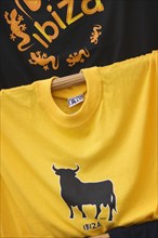SPAIN, Balearic Islands, Ibiza, T shirts for sale in Eivissa with logo of a bull.