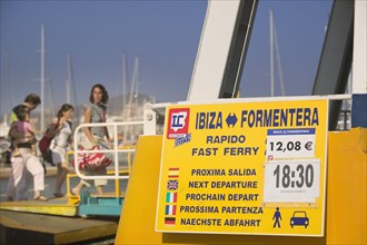SPAIN, Balearic Islands, Ibiza, "Boarding a passenger ferry bound for Formentera, Eivissa, with