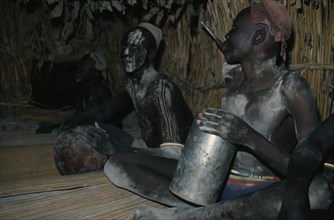 SUDAN, People, Boys, Dinka boys fattening themselves for eight weeks in preparation for manhood.