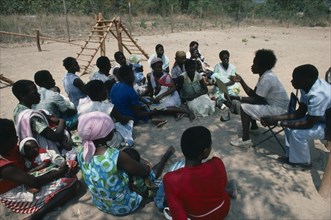 ZIMBABWE, Medical, Mobile clinic giving advice to mother and baby group.