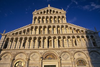 ITALY, Tuscany, Pisa, Duomo.  Pisan-Romanesque four tiered exterior facade.