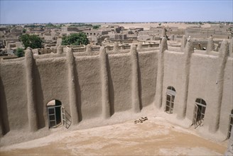 MALI, Sahel, Djenne, Courtyard of the Grand Mosque and rooftops of town beyond.