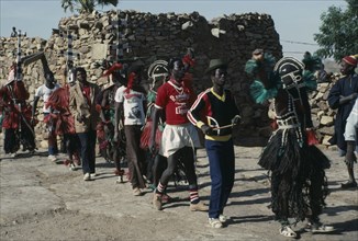 MALI, Ceremony, Dogon funeral dance.  Dancers wear masks depicting mythical animals and believe