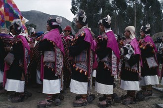 BOLIVIA, Sucre, Tarabuco, Phujllay yampara independence carnival celebrations.  Line of dancers