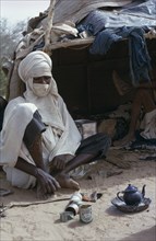 NIGER, People, Men, Tuareg men in encampment near Inwaggeur.