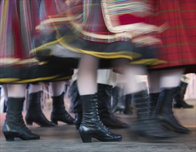 POLAND, Warsaw, "Detail of traditional dancers' costumes performing in the Old Town. Moving,
