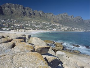 SOUTH AFRICA, Western Cape, Cape Penninsula, View across rocks towards Clifton bay and beach.
