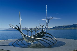 ICELAND, Reykjavik, Near klapparstigur. Viking Ship sculpture called the Suncraft