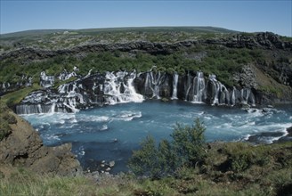 ICELAND, Borgarfjordur, Hraunfossar Falls on the Hvita River. Water comes from beneath