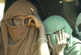 SUDAN, Redsea Hills Province, People, Beja women wearing veils.
