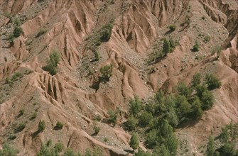 MOROCCO, High Atlas Mountains, Aerial view over eroded rock and scree slopes.