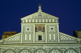 ITALY, Tuscany, Florence, San Miniato al Monte Romanesque church begun in 1018.   Exterior facade