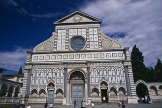 ITALY, Tuscany, Florence, Santa Maria Novella exterior facade with geometric design and central