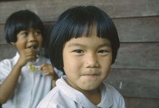 THAILAND, North, Chiang Mai, Portrait of primary school girl.