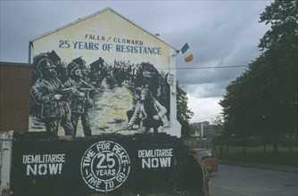 IRELAND, North, Belfast, Falls Road. Mural displaying twenty five years of troubles