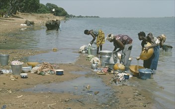 MALI, Washing, Women washing clothes in the River Niger.