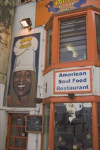ENGLAND, East Sussex, Brighton, Momma Cherrys Soul Food Restaurant frontage.