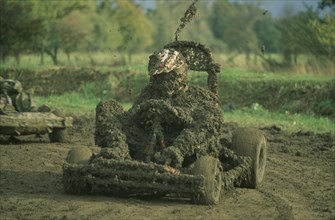 SPORT, Motorsport, Karting, Mud covered competitor in rally kart six hour charity endurance race