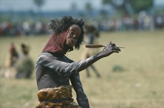 CONGO, Gunga, Masked dancer at Bapende tribe Gunga Festival.