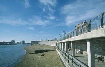 ENGLAND, Hampshire, Portsmouth, Old Portsmouth. Occupied strectch of beach next to the Walls with