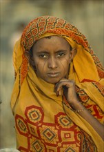 SUDAN, Tribal People, Portrait of Eritrean refugee woman with facial scarification and wearing