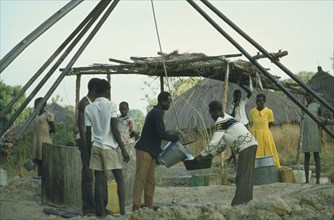 ETHIOPIA, Work, Collecting water at well sunk by International Voluntary Service.