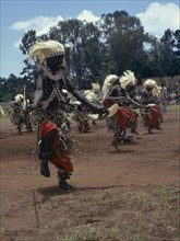 RWANDA, Tutsi, All male traditionally adorned Tutsi intore dancers characterised by coordinated