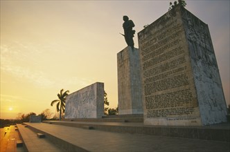 CUBA, Santa Clara, Plaza de la Revolution.  Statue of Che Guevara at sunset.