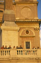 ITALY, Lazio, Rome, People watching sunset from Trinita dei Monti sixteenth century church at the