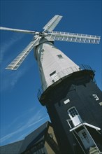 ENGLAND, Kent, Cranbrook, Angled view of Windmill museum. Union Mill is a white weatherboarded