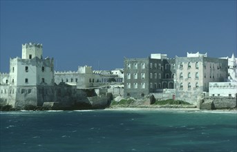 SOMALIA, Mogadishu, View towards fort and old waterfront buildings from the sea.