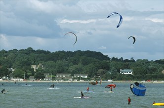 ENGLAND, Dorset, Sandbanks,  Poole Harbour. Kite Surfing