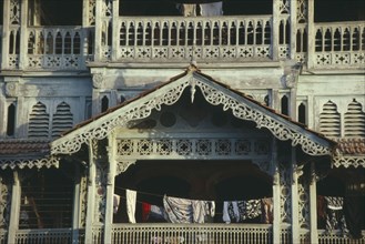 TANZANIA, Zanzibar Island, Zanzibar Town, Old Dispensary.  Detail of carved porch and balconies.