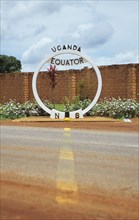 UGANDA, Equator, North and South sign. Line across the road.