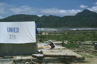 INDONESIA, Tsunami, Aceh Province, Displaced peoples camp after December 2004. UNHCR tent in the