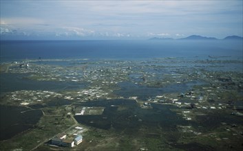 INDONESIA, Tsunami, Aceh Province, "Aerial shot looking down on flooded Banda Aceh, 5 months after