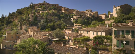 SPAIN, Balearic Islands, Mallorca, Deia. Panoramic view of the village.