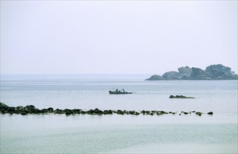 NORTH KOREA, East Coast, Tongjoson Bay, Distant fishing boat.