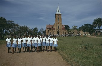 CONGO, Lisala, School choir posing for photograph outside Lisala Cathedral.