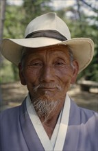 SOUTH KOREA, People, Men, Portrait of grandfather wearing hat.