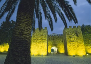 PORTUGAL, Algarve, Lagos, Medieval city gate of Forte Ponta da Bandeira illuminated at night with