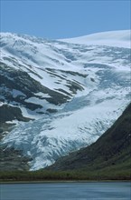 NORWAY, Svartisen Glacier, Rocky coastline.
