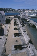 UNITED KINGDOM, Channel Islands, Guernsey, St Peter Port. Castle Cornet. View above Cannons lined