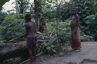 CONGO, Ituri Forest, Pygmy group in forest clearing.