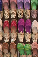 UAE, Dubai, Colourful traditional Arab footware for sale in Old Souk.