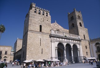 ITALY, Sicily, Palermo, Monreale. II Duomo Norman Cathedral exterior with people gathered around